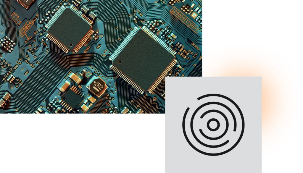 Detailed view of a computer circuit board with square chips and concentric circles design in the corner.